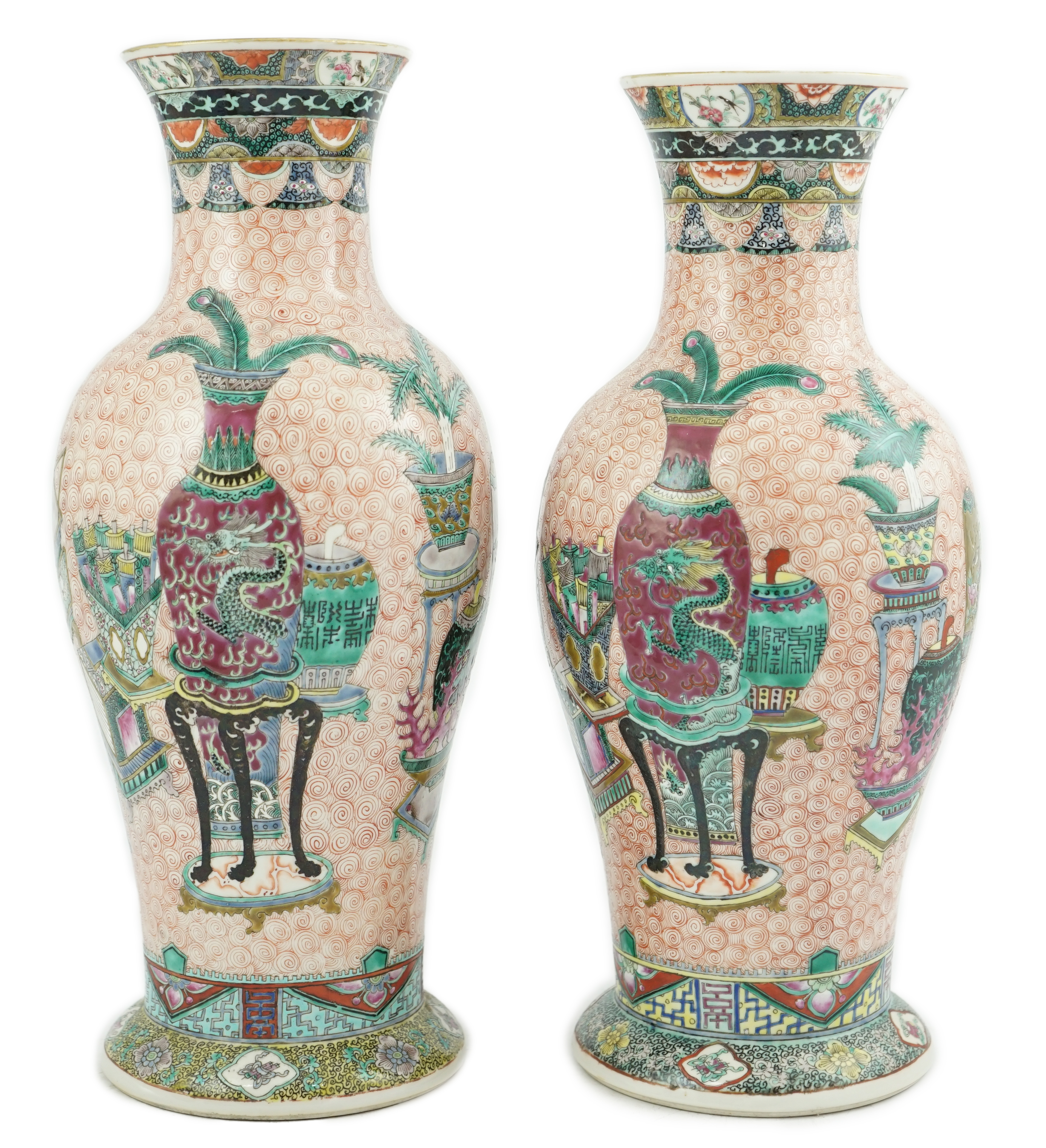 A near pair of Chinese famille rose ‘Hundred Antiques’ baluster vases, Kangxi mark, early 20th century